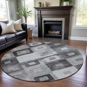 HomeRoots 8' Gray And Silver Geometric Round Rug - Washable, UV-Protected, Stylish for Indoor & Outdoor Spaces 686684