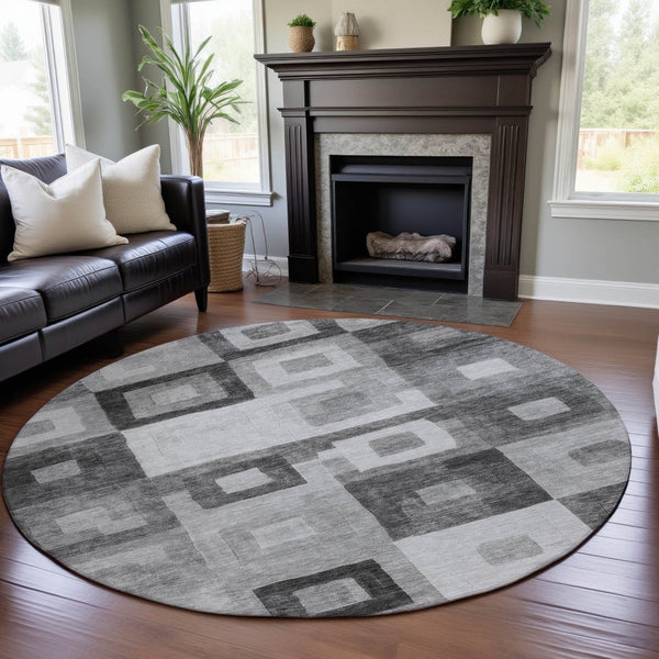 HomeRoots 8' Gray And Silver Geometric Round Rug - Washable, UV-Protected, Stylish for Indoor & Outdoor Spaces 686684