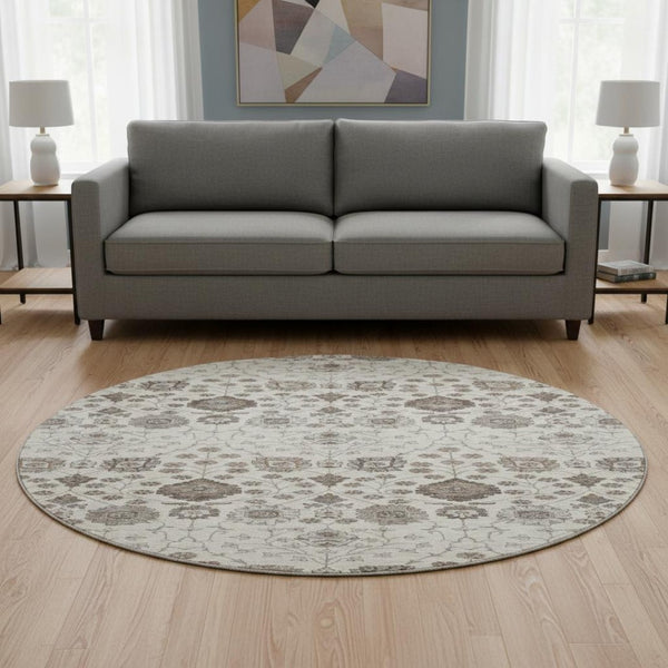 HomeRoots 8' Elegant Floral Round Rug in Ivory, Brown & Gray - Washable, UV-Protected & Durable Design 687008