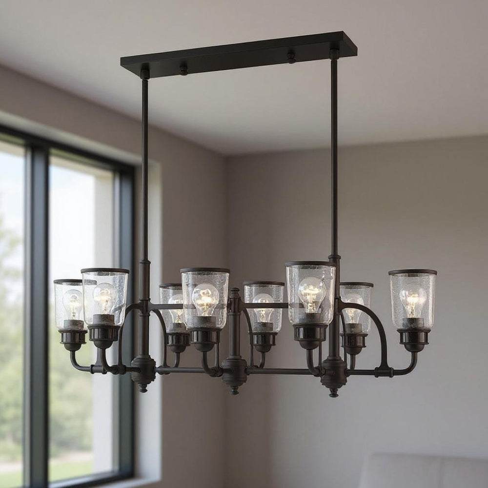 HomeRoots Bronze Eight-Light Dimmable Chandelier - Elegant Cylinder Design for Dining Rooms & Living Spaces 687134