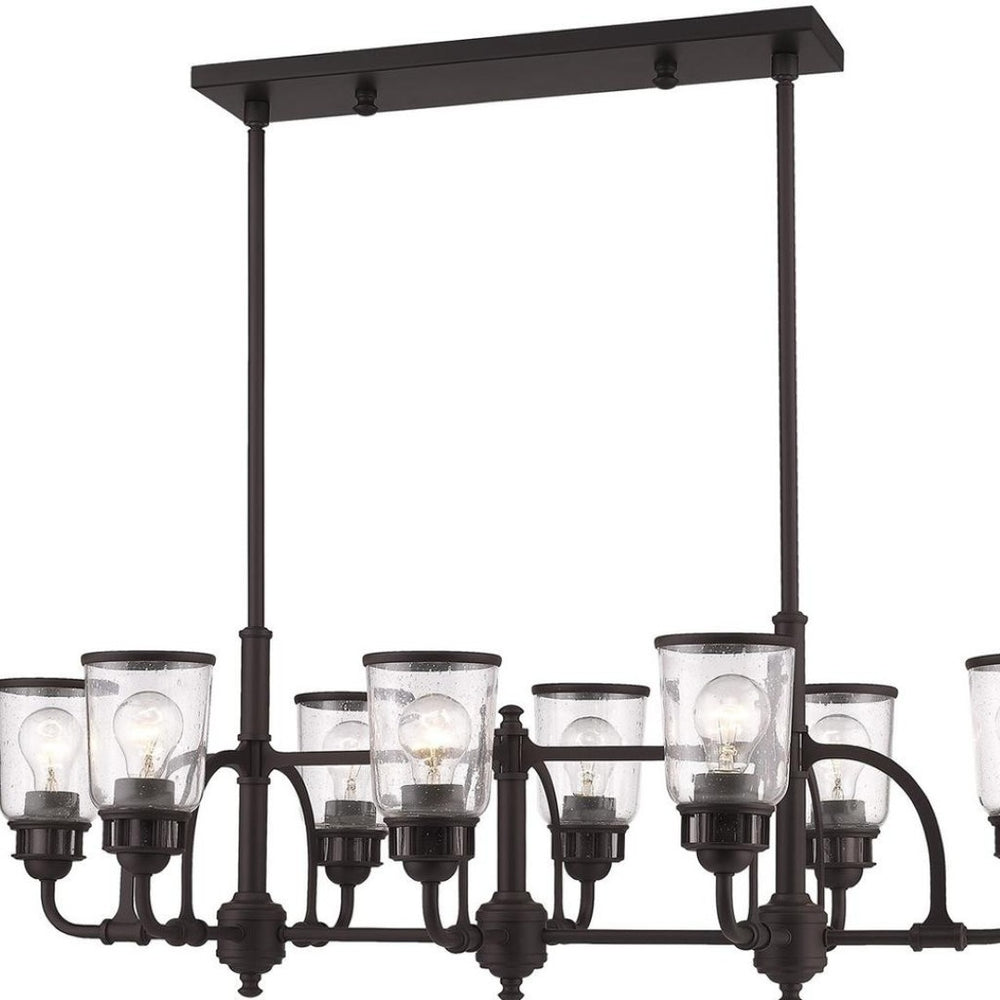 HomeRoots Bronze Eight-Light Dimmable Chandelier - Elegant Cylinder Design for Dining Rooms & Living Spaces 687134