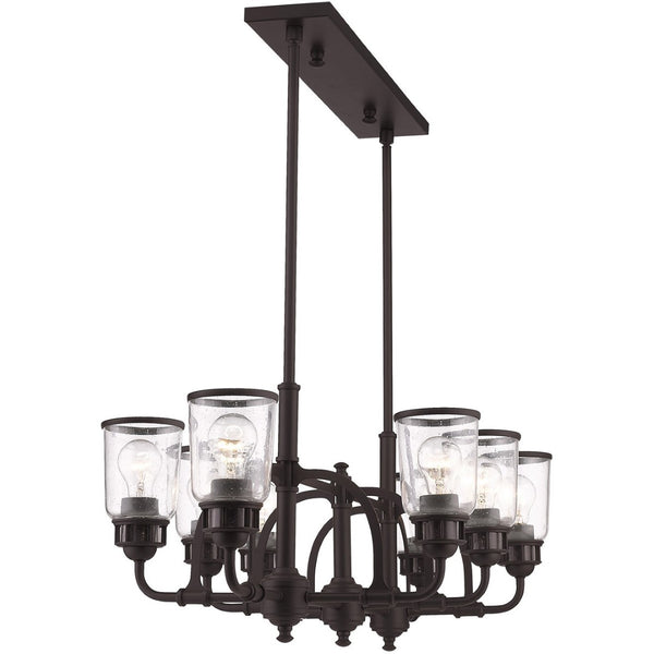 HomeRoots Bronze Eight-Light Dimmable Chandelier - Elegant Cylinder Design for Dining Rooms & Living Spaces 687134
