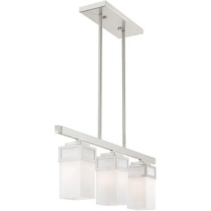 HomeRoots Three Light Dimmable Chandelier – Modern Cylinder Shades for Adjustable Ambiance in Any Space 687145