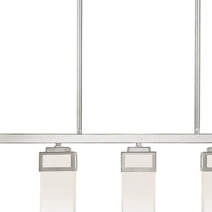 HomeRoots Five Light Dimmable Chandelier - Modern Elegance with Cylindrical Shades for Versatile Home Lighting 687146