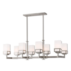 HomeRoots Eight Light Dimmable Chandelier with Sleek Cylinder Shades for Modern Ambiance in Any Space 687149