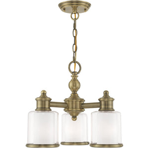HomeRoots Three Light Dimmable Chandelier with Modern Cylindrical Shades for Stylish Home Illumination 687150