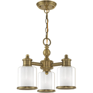 HomeRoots Three Light Dimmable Chandelier with Modern Cylindrical Shades for Stylish Home Illumination 687150
