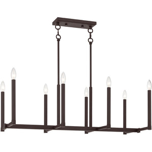 HomeRoots Bronze Eight-Light Dimmable Chandelier with Cylinder Shades for Elegant Ambiance & Warmth 687161