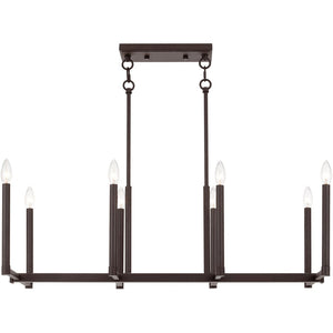 HomeRoots Bronze Eight-Light Dimmable Chandelier with Cylinder Shades for Elegant Ambiance & Warmth 687161