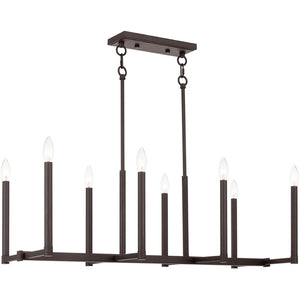 HomeRoots Bronze Eight-Light Dimmable Chandelier with Cylinder Shades for Elegant Ambiance & Warmth 687161