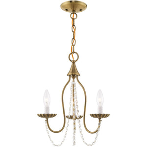 HomeRoots Three Light Dimmable Chandelier with Cylinder Shades for Modern Dining Rooms and Living Spaces 687194