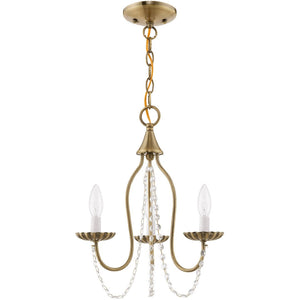 HomeRoots Three Light Dimmable Chandelier with Cylinder Shades for Modern Dining Rooms and Living Spaces 687194