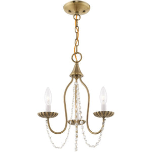 HomeRoots Three Light Dimmable Chandelier with Cylinder Shades for Modern Dining Rooms and Living Spaces 687194