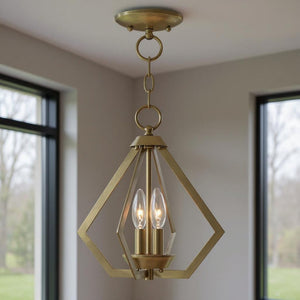 HomeRoots Two Light Dimmable Chandelier – Sleek Cylinder Shades for Contemporary Home Ambiance & Style 687260