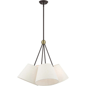 HomeRoots Four Light Dimmable Chandelier with Elegant Cylinder Shades for Modern Home Ambiance and Style 687320
