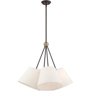 HomeRoots Four Light Dimmable Chandelier with Elegant Cylinder Shades for Modern Home Ambiance and Style 687320