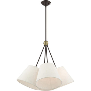 HomeRoots Four Light Dimmable Chandelier with Elegant Cylinder Shades for Modern Home Ambiance and Style 687320
