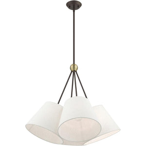 HomeRoots Four Light Dimmable Chandelier with Elegant Cylinder Shades for Modern Home Ambiance and Style 687320