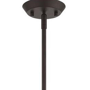 HomeRoots Four Light Dimmable Chandelier with Elegant Cylinder Shades for Modern Home Ambiance and Style 687320