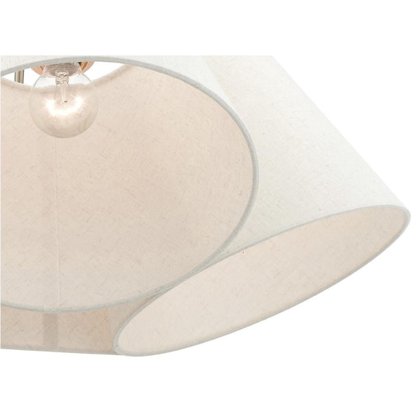 HomeRoots Four Light Dimmable Chandelier with Sleek Cylindrical Shades for Modern Home Decor and Ambiance 687321
