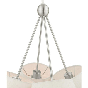 HomeRoots Four Light Dimmable Chandelier with Sleek Cylindrical Shades for Modern Home Decor and Ambiance 687321