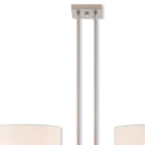 HomeRoots Two Light Dimmable Chandelier – Modern Cylinder Shades, Durable Steel, Adjustable Brightness, Stylish Focal Point 687336