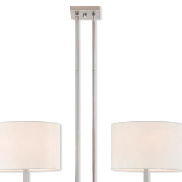 HomeRoots Two Light Dimmable Chandelier – Modern Cylinder Shades, Durable Steel, Adjustable Brightness, Stylish Focal Point 687336