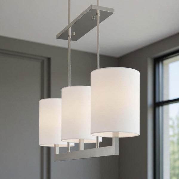 HomeRoots Three Light Dimmable Chandelier – Modern Steel Fixture with Cylindrical Shades for Stylish Illumination 687337