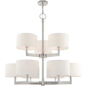HomeRoots Nickel Elegant Nine-Light Dimmable Chandelier with Off-White Shades for Modern Home Decor Charm 687340