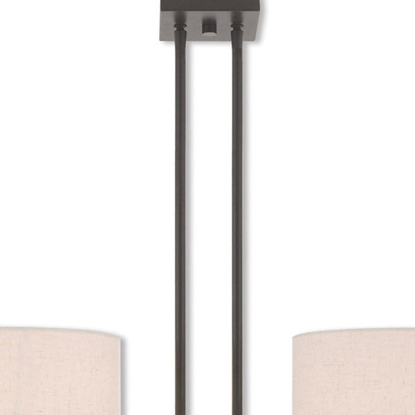 HomeRoots Bronze Two-Light Dimmable Chandelier with Unique Cylinder Shades for Elegant Home Illumination 687341