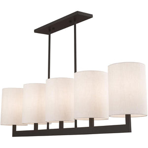 HomeRoots Bronze Five-Light Dimmable Chandelier with Elegant Cylinder Shades for Versatile Home Décor Solutions 687344