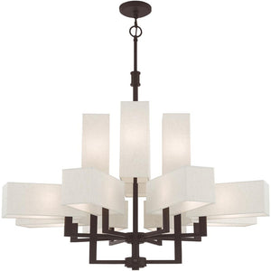 HomeRoots Bronze Twelve-Light Dimmable Chandelier - Elegant Ambient Lighting for Modern & Transitional Spaces 687354