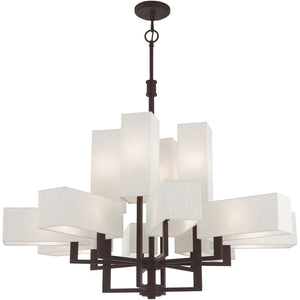 HomeRoots Bronze Twelve-Light Dimmable Chandelier - Elegant Ambient Lighting for Modern & Transitional Spaces 687354