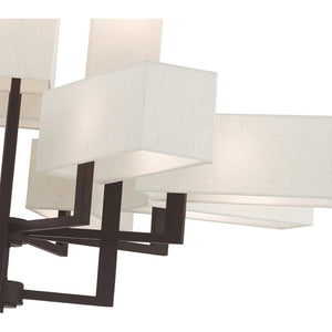 HomeRoots Bronze Twelve-Light Dimmable Chandelier - Elegant Ambient Lighting for Modern & Transitional Spaces 687354