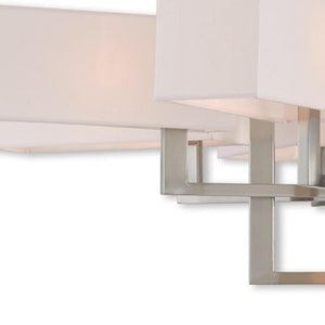 HomeRoots Twelve Light Dimmable Chandelier - Modern Steel Design for Versatile Home Ambiance & Style 687356