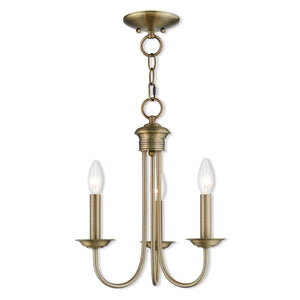 HomeRoots Three Light Dimmable Chandelier with Sleek Cylinder Shades for Modern Home Ambiance & Style 687357