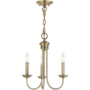 HomeRoots Three Light Dimmable Chandelier with Sleek Cylinder Shades for Modern Home Ambiance & Style 687357
