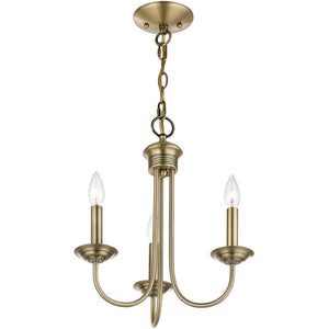 HomeRoots Three Light Dimmable Chandelier with Sleek Cylinder Shades for Modern Home Ambiance & Style 687357