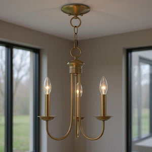 HomeRoots Three Light Dimmable Chandelier with Sleek Cylinder Shades for Modern Home Ambiance & Style 687357