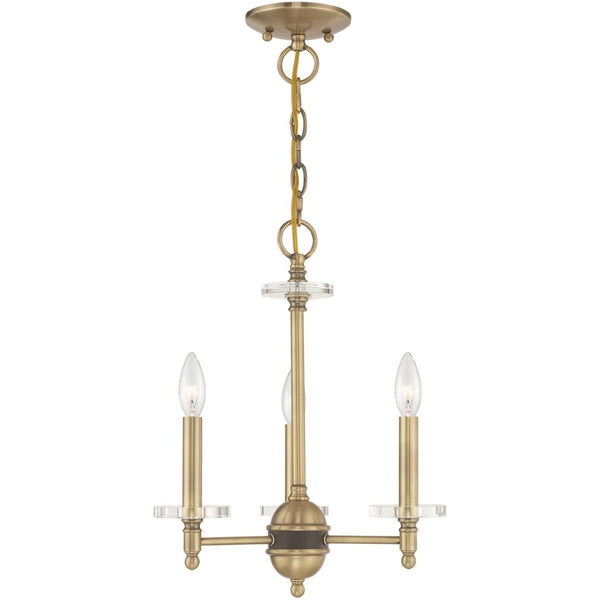 HomeRoots Antiqued Brass Three-Light Chandelier with Clear Shades – Vintage Elegance for Modern Spaces 687377