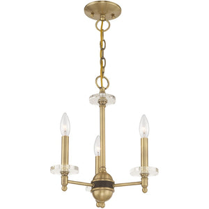 HomeRoots Antiqued Brass Three-Light Chandelier with Clear Shades – Vintage Elegance for Modern Spaces 687377