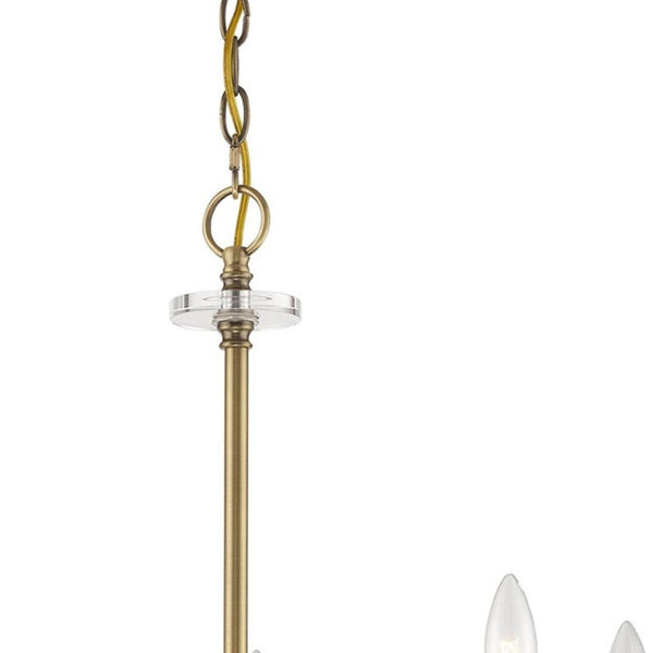 HomeRoots Antiqued Brass Five-Light Dimmable Chandelier with Clear Cylinder Shades for Elegant Illumination 687380