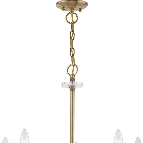 HomeRoots Antiqued Brass Five-Light Dimmable Chandelier with Clear Cylinder Shades for Elegant Illumination 687380