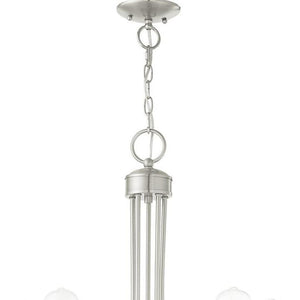 HomeRoots Five Light Dimmable Chandelier - Modern Cylinder Design for Dining Rooms and Living Spaces, 25" Wide 687396