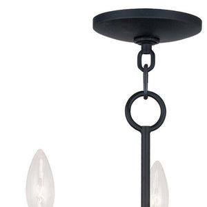 HomeRoots Black Three-Light Dimmable Chandelier with Cylinder Shades for Modern Home Ambiance & Style 687408