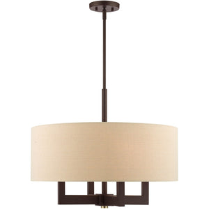 HomeRoots Four Light Dimmable Chandelier - Modern Steel Shades, Cylindrical Design for Stylish Home Lighting 687439