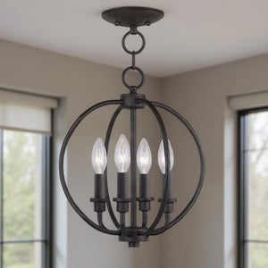 HomeRoots Bronze Four-Light Dimmable Chandelier with Cylinder Shades - Elegant Steel Fixture for Any Room 687450