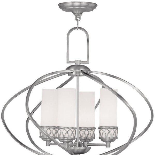 HomeRoots Four Light Dimmable Chandelier with Sleek Cylinder Shades for Modern Home Ambiance & Style 687496