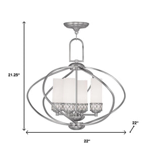 HomeRoots Four Light Dimmable Chandelier with Sleek Cylinder Shades for Modern Home Ambiance & Style 687496