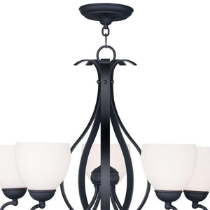 HomeRoots Black Five-Light Dimmable Chandelier - Modern Cylindrical Shades for Elegant Ambient Lighting 687499